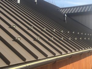 snow guards and snow retention